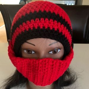 Hand made crochet hat with detachable mask.